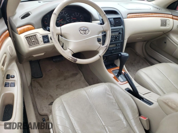 2002 Toyota Solara SE with VIN 2T1CF28P42C601042, listed as a Copart auction lot 74818624 with 70,551 mi miles and Salvage Title. Bid and sale history available at DreamBid. Image 8.