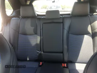 2023 Toyota RAV4 Hybrid XSE with VIN 2T3E6RFV9PW039963, listed as a Copart auction lot 57594335 with 27,486 mi miles and Salvage title. Bid and sale history available at DreamBid. Image 10.