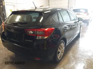 2021 Subaru Impreza with VIN 4S3GTAB61M3703303, listed as a IAAI auction lot 41508372 with 39,835 mi miles. Bid and sale history available at carsss.com. Image 3.