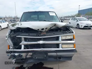 1997 Chevrolet Suburban with VIN 3GNFK16R9VG187426, listed as a IAAI auction lot 41678063 with 131,387 mi miles. Bid and sale history available at carsss.com. Image 12.