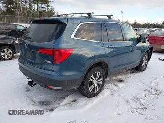 2018 Honda Pilot EX-L with VIN 5FNYF6H57JB007065, listed as a IAAI auction lot 41418432 with 123,806 mi miles. Bid and sale history available at carsss.com. Image 4.
