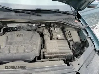 2021 Volkswagen Tiguan SE z VIN 3VV2B7AX8MM061267, wystawiony jako Copart lot #67647915 z przebiegiem 61 528 mil mil oraz Szkoda całkowita • Salvage title. Historia ofert i sprzedaży dostępna na DreamBid. Obrazek 14.