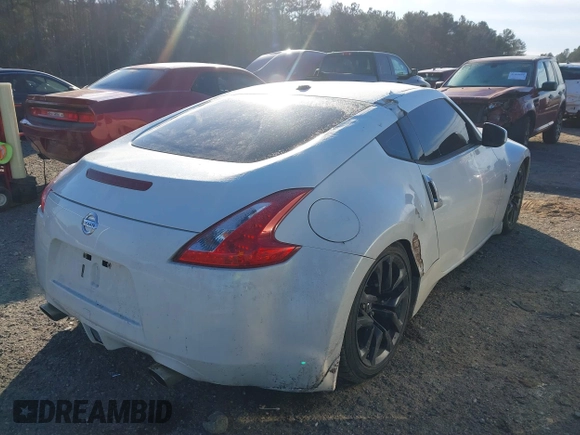 2015 Nissan 370Z Sport with VIN JN1AZ4EH0FM440627, listed as a IAAI auction lot 41410844 with 99,420 mi miles. Bid and sale history available at carsss.com. Image 4.