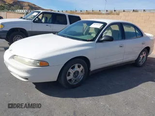 2001 Oldsmobile Intrigue GX z VIN 1G3WH52H11F140740, wystawiony jako IAAI lot #40799284 z przebiegiem 131 940 mil mil oraz . Historia ofert i sprzedaży dostępna na DreamBid. Obrazek 2.
