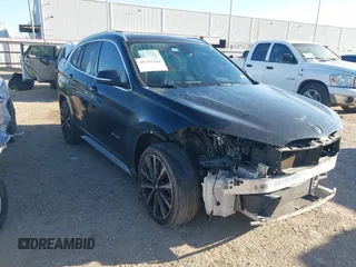 2018 BMW X1 sDrive28i with VIN WBXHU7C30J5L04913, listed as a IAAI auction lot 41755344 with 101,867 mi miles. Bid and sale history available at carsss.com. Image 1.