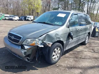 2005 Kia Sedona LX with VIN KNDUP132X56678100, listed as a IAAI auction lot 42085299 with 115,217 mi miles. Bid and sale history available at carsss.com. Image 6.
