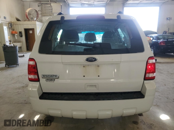 2012 Ford Escape XLS с VIN 1FMCU9C73CKA35456, выставлен на аукционе Copart как лот 54230285 с пробегом 174 263 миль миль и Списание • Salvage title. История ставок и продаж доступна на DreamBid. Изображение 6.