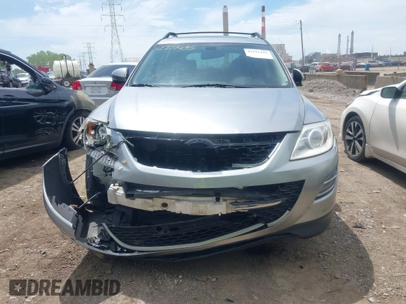 2011 Mazda CX-9 Grand Touring with VIN JM3TB3DV2B0332191, listed as a IAAI auction lot 42211435 with 155,801 mi miles and . Bid and sale history available at DreamBid. Image 6.