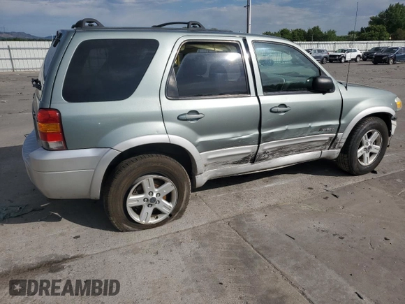2005 Ford Escape Hybrid z VIN 1FMCU95HX5KE24619, wystawiony jako Copart lot #60624765 z przebiegiem 209 937 mil mil oraz Nie do naprawy • Non repairable. Historia ofert i sprzedaży dostępna na DreamBid. Obrazek 3.
