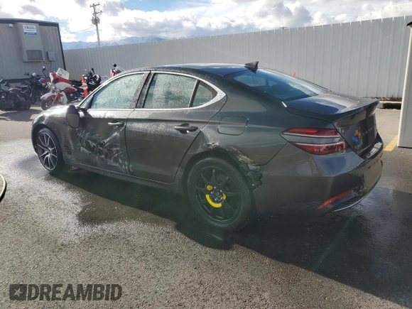 2023 Genesis G70 2.0T with VIN KMTG34TA4PU129199, listed as a Copart auction lot 80963124 with 15,729 mi miles and Salvage Title. Bid and sale history available at carsss.com. Image 2.