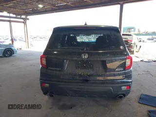 2021 Honda Passport Sport with VIN 5FNYF8H27MB021098, listed as a IAAI auction lot 41333241 with 101,239 mi miles and . Bid and sale history available at DreamBid. Image 16.