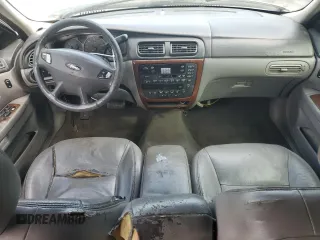2003 Ford Taurus z VIN 1FAHP59U73A217826, wystawiony jako Copart lot #80059964 z przebiegiem 315 560 mil mil oraz Szkody całkowita. Historia ofert i sprzedaży dostępna na DreamBid. Obrazek 8.