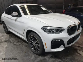 2019 BMW X4 M40i with VIN 5UXUJ5C58KLJ63742, listed as a IAAI auction lot 41355753 with 34,232 mi miles. Bid and sale history available at carsss.com. Image 1.