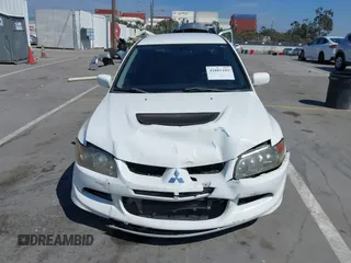 2005 Mitsubishi Lancer Evolution VIII with VIN JA3AH86DX5U054278, listed as a IAAI auction lot 41881180 with 157,497 mi miles. Bid and sale history available at carsss.com. Image 12.