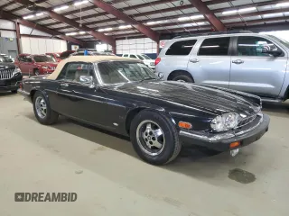1988 Jaguar XJS z VIN SAJNV5843JC147927, wystawiony jako Copart lot #58988575 z przebiegiem 81 239 mil mil oraz Tytuł czysty. Historia ofert i sprzedaży dostępna na DreamBid. Obrazek 4.