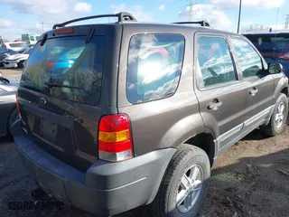 2007 Ford Escape XLS with VIN 1FMYU92Z37KB90832, listed as a IAAI auction lot 41217549 with 114,433 mi miles. Bid and sale history available at carsss.com. Image 4.