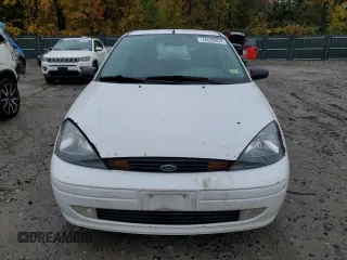 2004 Ford Focus with VIN 3FAFP37Z94R101447, listed as a Copart auction lot 74570054 with 162,166 mi miles and Salvage title. Bid and sale history available at DreamBid. Image 5.