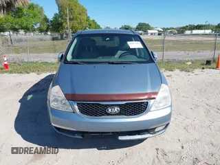 2014 Kia Sedona EX with VIN KNDMH4C70E6553732, listed as a IAAI auction lot 41812283 with 676,894 mi miles. Bid and sale history available at carsss.com. Image 6.