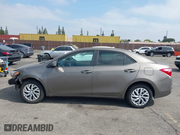 2018 Toyota Corolla L with VIN 5YFBURHE6JP774827, listed as a IAAI auction lot 42598086 with 29,400 mi miles and . Bid and sale history available at DreamBid. Image 14.
