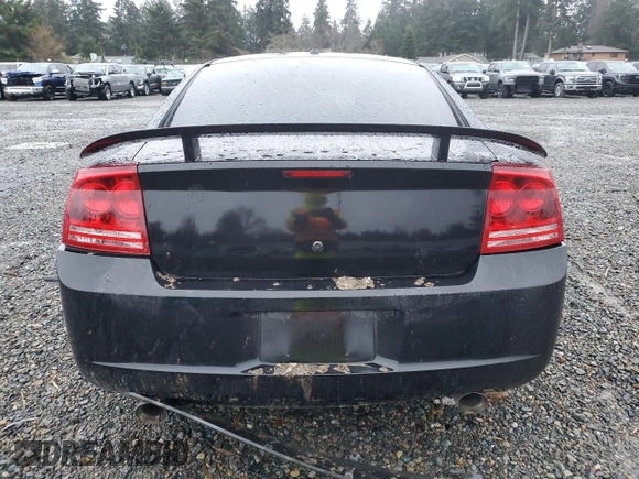 2006 Dodge Charger SRT-8 with VIN 2B3LA73W76H512508, listed as a Copart auction lot 86312114 with 177,592 mi miles and Salvage Title. Bid and sale history available at DreamBid. Image 6.
