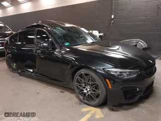 2018 BMW M3 with VIN WBS8M9C5XJ5L71599, listed as a IAAI auction lot 41932825 with 53,730 mi miles. Bid and sale history available at carsss.com. Image 1.