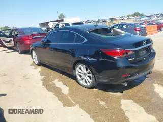 2015 Mazda 6 i Touring with VIN JM1GJ1T68F1171485, listed as a IAAI auction lot 42018487 with 208,916 mi miles and . Bid and sale history available at carsss.com. Image 3.