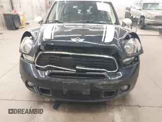 2014 MINI Countryman S with VIN WMWZC5C56EWP38017, listed as a IAAI auction lot 42287308 with 151,780 mi miles and . Bid and sale history available at DreamBid. Image 6.