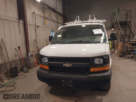 2015 Chevrolet Express Cargo Van with VIN 1GCWGFCF9F1167677, listed as a IAAI auction lot 42018087 with 148,263 mi miles. Bid and sale history available at carsss.com. Image 6.