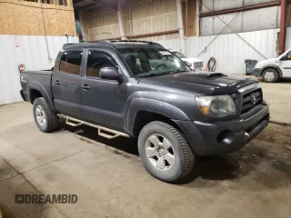 2009 Toyota Tacoma z VIN 3TMLU42N79M027000, wystawiony jako Copart lot #58371365 z przebiegiem 168 989 mil mil oraz Szkoda całkowita • Salvage title. Historia ofert i sprzedaży dostępna na DreamBid. Obrazek 4.