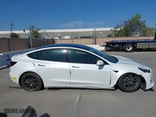2022 Tesla Model 3 Long Range with VIN 5YJ3E1EB3NF179304, listed as a IAAI auction lot 42003380 with 46,759 mi miles. Bid and sale history available at carsss.com. Image 13.