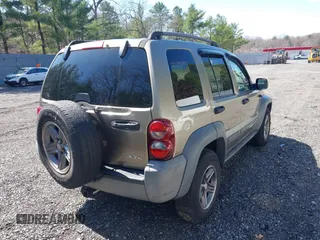 2005 Jeep Liberty Sport with VIN 1J4GL48K35W568972, listed as a IAAI auction lot 41980884 with 198,430 mi miles and . Bid and sale history available at DreamBid. Image 4.