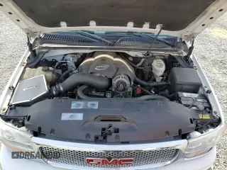 2005 GMC Sierra Denali z VIN 2GTEK63N051284302, wystawiony jako Copart lot #88031695 z przebiegiem 150 006 mil mil oraz Szkody całkowita. Historia ofert i sprzedaży dostępna na DreamBid. Obrazek 12.