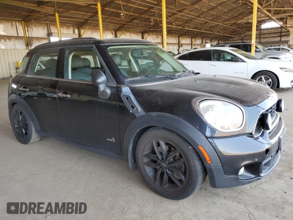 2011 MINI Countryman S with VIN WMWZC5C54BWM10218, listed as a Copart auction lot 60557685 with 192,422 mi miles and Salvage title. Bid and sale history available at DreamBid. Image 4.