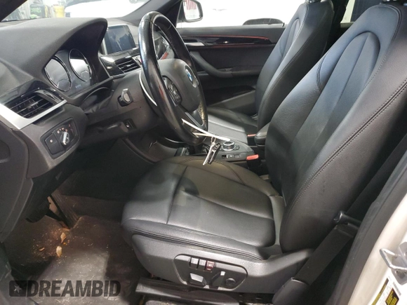 2018 BMW X1 sDrive28i with VIN WBXHU7C32J3H43903, listed as a Copart auction lot 45000375 with 76,158 mi miles and Salvage Title. Bid and sale history available at carsss.com. Image 7.