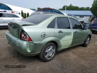 2007 Ford Focus S с VIN 1FAFP34NX7W333591, выставлен на аукционе Copart как лот 59693235 с пробегом 225 632 миль миль и Списание • Salvage title. История ставок и продаж доступна на DreamBid. Изображение 3.