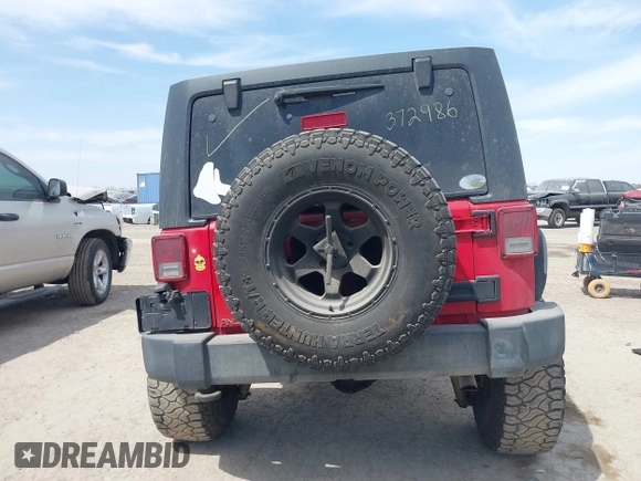 2015 Jeep Wrangler Unlimited Willys Wheeler with VIN 1C4BJWDG9FL750505, listed as a IAAI auction lot 41781762 with 139,000 mi miles and . Bid and sale history available at DreamBid. Image 17.