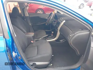 2009 Toyota Corolla with VIN 2T1BU40E69C154781, listed as a IAAI auction lot 42009936 with 180,039 mi miles. Bid and sale history available at carsss.com. Image 5.