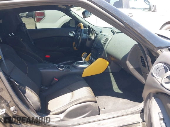 2019 Nissan 370Z Sport Touring with VIN JN1AZ4EH1KM420719, listed as a IAAI auction lot 42096816 with 97,803 mi miles and . Bid and sale history available at DreamBid. Image 5.
