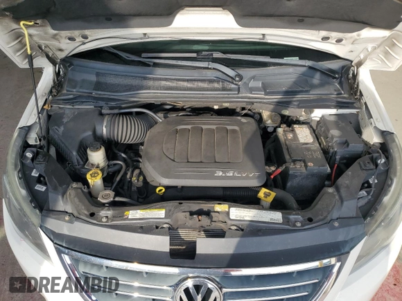 2011 Volkswagen Routan SE with VIN 2V4RW3DG7BR717718, listed as a Copart auction lot 63480915 with 271,938 mi miles and Salvage title. Bid and sale history available at DreamBid. Image 12.