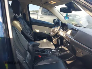 2016 Mazda CX-5 Grand Touring with VIN JM3KE2DY1G0708572, listed as a IAAI auction lot 41685298 with 109,427 mi miles. Bid and sale history available at carsss.com. Image 5.
