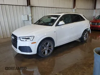 2018 Audi Q3 Premium Plus with VIN WA1JCCFS5JR034349, listed as a Copart auction lot 61157705 with 104,611 mi miles and Salvage title. Bid and sale history available at DreamBid. Image 1.