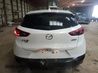 2016 Mazda CX-3 Touring z VIN JM1DKBC78G0105220, wystawiony jako Copart lot #57576535 z przebiegiem 259 832 mil mil oraz Szkody całkowita. Historia ofert i sprzedaży dostępna na DreamBid. Obrazek 6.