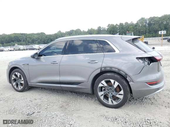 2021 Audi e-tron Premium with VIN WA1AAAGE7MB026088, listed as a Copart auction lot 67596704 with 25,580 mi miles and Salvage Title. Bid and sale history available at carsss.com. Image 2.