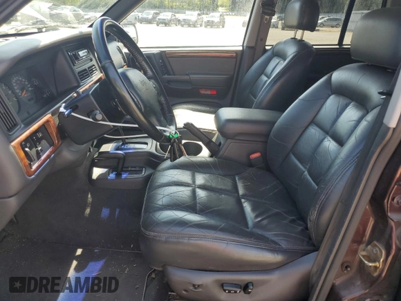 1997 Jeep Grand Cherokee Limited with VIN 1J4GZ78Y7VC727224, listed as a Copart auction lot 53204075 with 79,206 mi miles and Clean title. Bid and sale history available at DreamBid. Image 7.