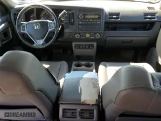2010 Honda Ridgeline RTL with VIN 5FPYK1F54AB002253, listed as a Copart auction lot 49992265 with 192,841 mi miles and Salvage Title. Bid and sale history available at carsss.com. Image 8.
