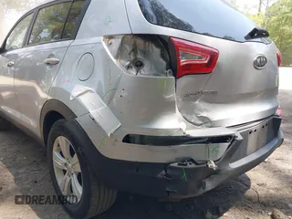 2012 Kia Sportage LX with VIN KNDPB3A22C7342085, listed as a IAAI auction lot 42313425 with 112,005 mi miles and . Bid and sale history available at DreamBid. Image 6.