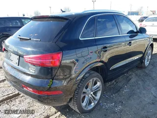 2016 Audi Q3 Premium Plus with VIN WA1EFCFS1GR011801, listed as a IAAI auction lot 41691273 with 126,554 mi miles. Bid and sale history available at carsss.com. Image 4.