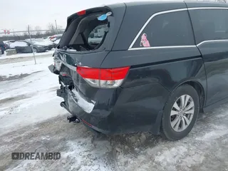 2015 Honda Odyssey EX-L with VIN 5FNRL5H60FB018030, listed as a IAAI auction lot 41608357 with 166,214 mi miles and . Bid and sale history available at carsss.com. Image 17.