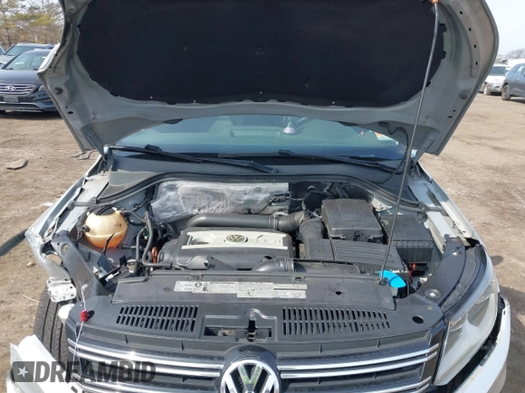 2012 Volkswagen Tiguan S z VIN WVGBV7AX9CW571627, wystawiony jako IAAI lot #41710871 z przebiegiem 157 998 mil mil oraz . Historia ofert i sprzedaży dostępna na DreamBid. Obrazek 10.