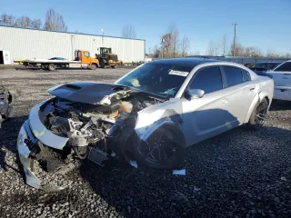 2022 Dodge Charger SRT Hellcat Widebody z VIN 2C3CDXL98NH159571, wystawiony jako Copart lot #87457204 z przebiegiem 15 828 mil mil oraz Szkoda całkowita • Salvage title. Historia ofert i sprzedaży dostępna na DreamBid. Obrazek 1.